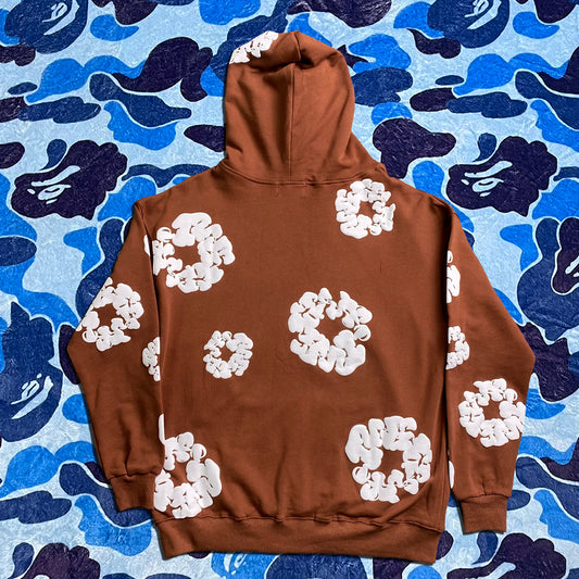 denim-tears-the-cotton-wreath-hoodie-brown-2-Drip Store Argentina