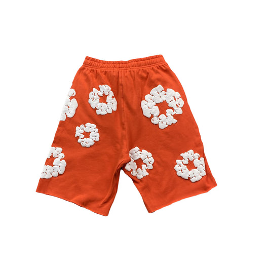 denim-tears-the-cotton-wreath-shorts-orange-2-Drip Store Argentina