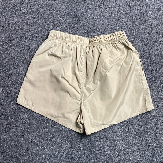 fear-of-god-essentials-running-nylon-short-egg-shell-2-Drip Store Argentina