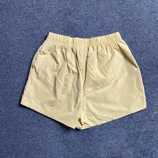 fear-of-god-essentials-running-nylon-short-light-tuscan-2-Drip Store Argentina