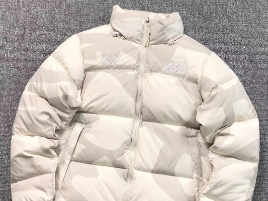 kaws-x-the-north-face-retro-1996-nuptse-jacket-moonlight-ivory-2-Drip Store Argentina
