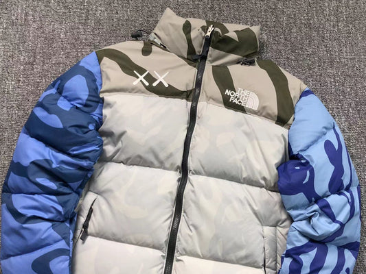 kaws-x-the-north-face-retro-1996-nuptse-jacket-moonlight-ivory-2_037681e1-Drip Store Argentina