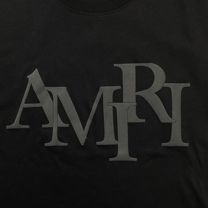 AMIRI STAGGERED LOGO TEE BLACK