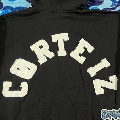 Campera Corteiz Arch Colly Negra L-XL