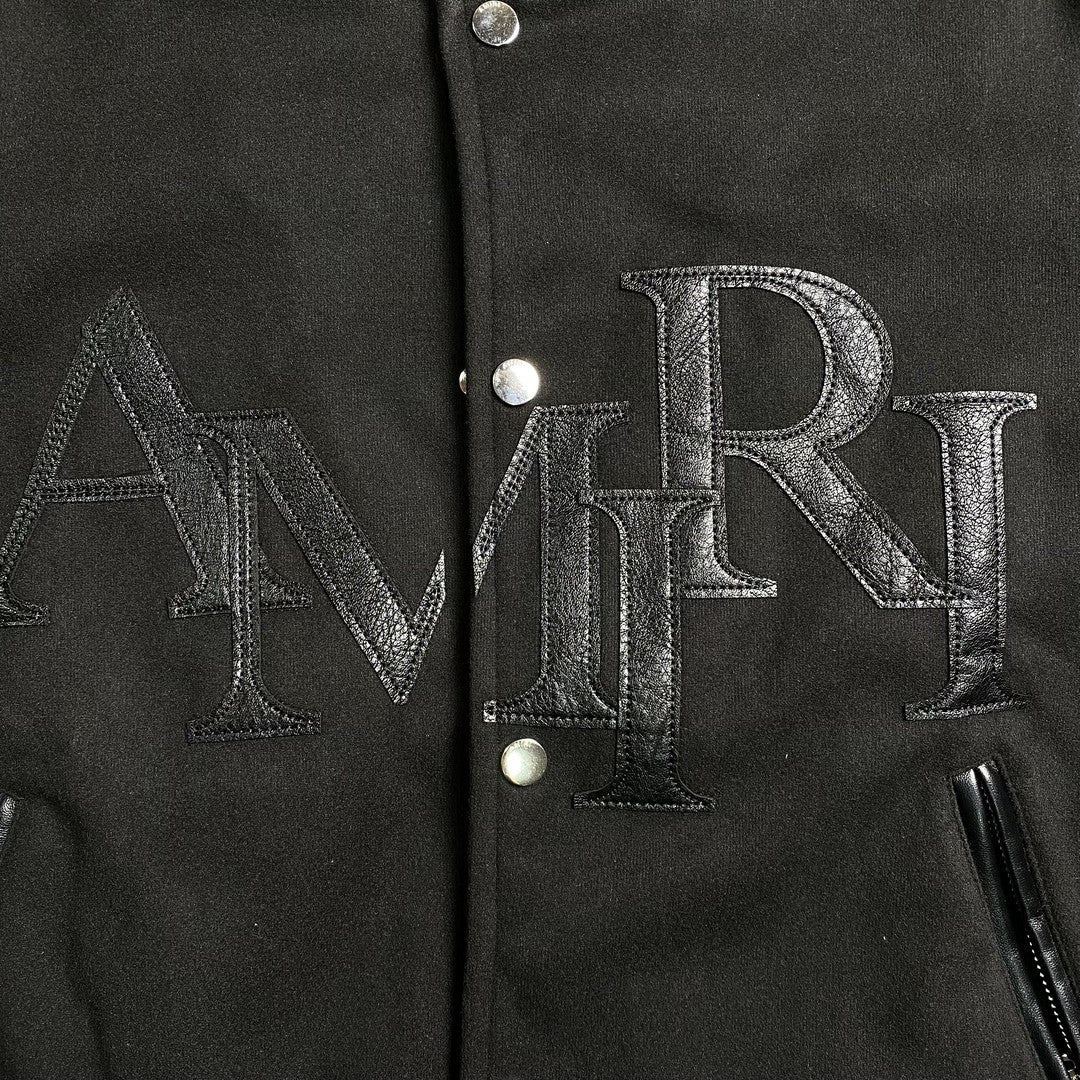 AMIRI STAGGERED LOGO VARSITY JACKET BLACK