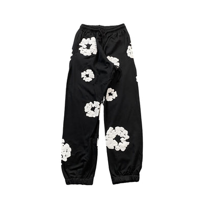 DENIM TEARS THE COTTON WREATH SWEATPANTS BLACK