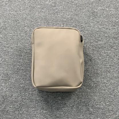 FEAR OF GOD ESSENTIALS SHOULDER BAG BEIGE