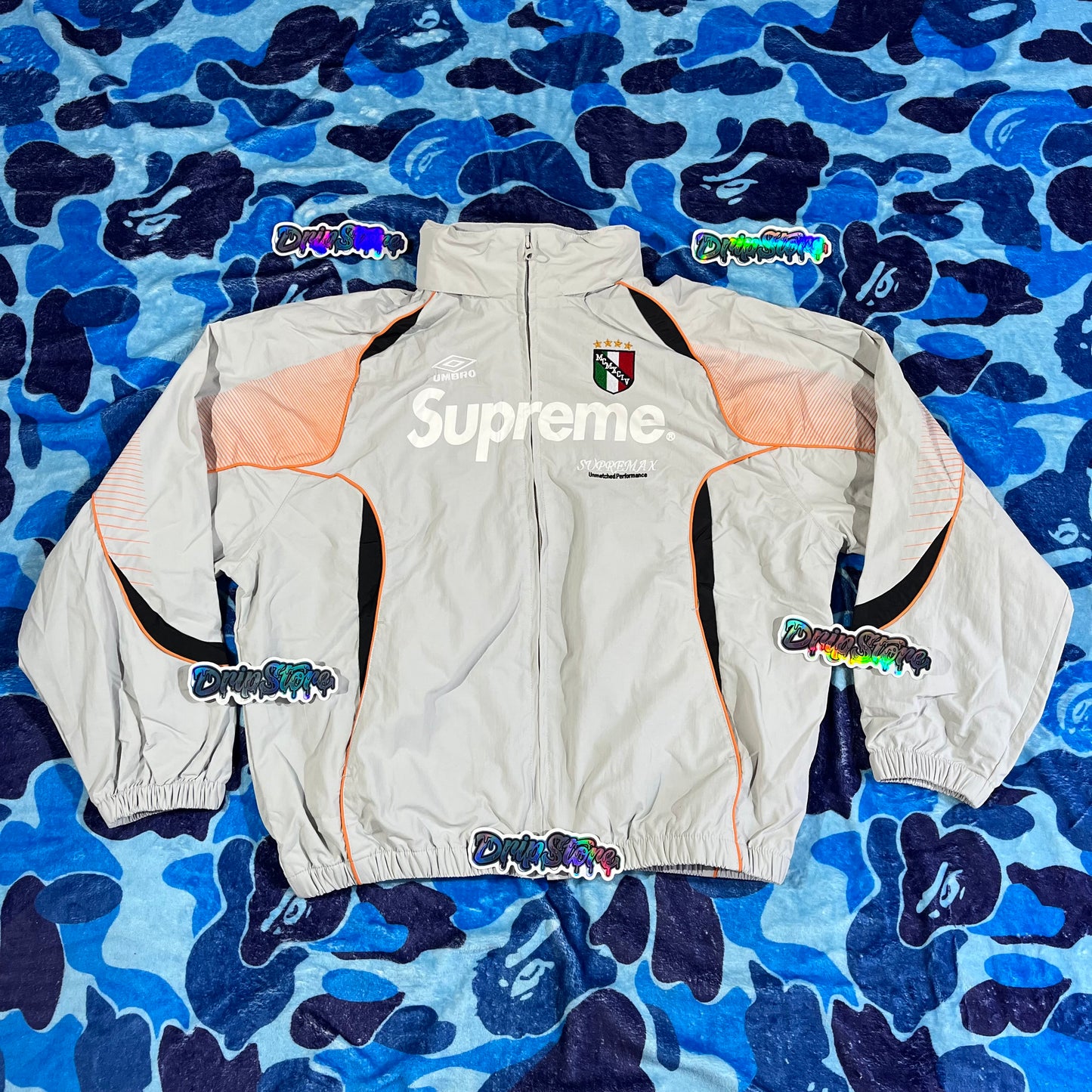 Campera Supreme X Umbro Gris M