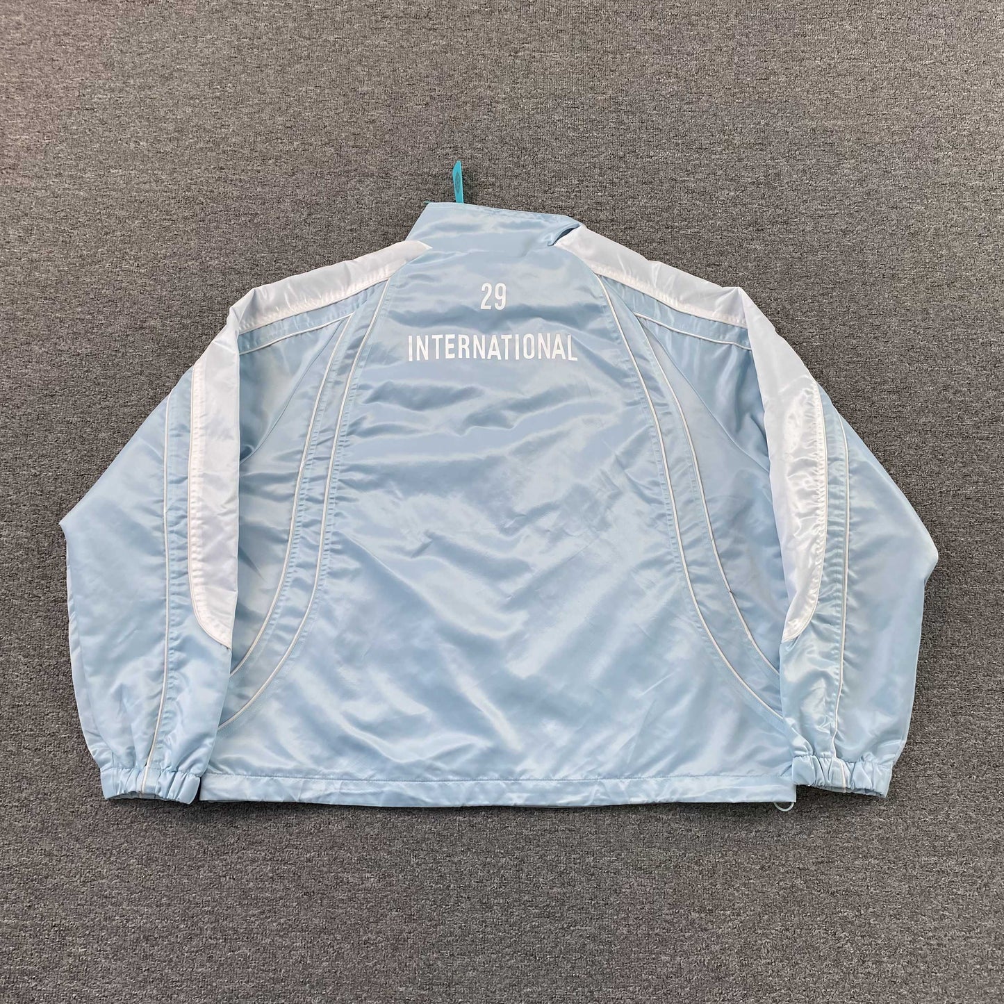 Campera Supreme Satin Piping Pullover Celeste