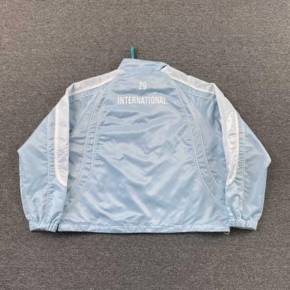 Campera Supreme Satin Piping Pullover Celeste