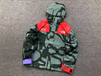 KAWS X THE NORTH FACE RETRO 1986 MOUNTAIN JACKET BALSAM GREEN 86