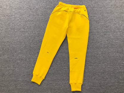 NIKE X DRAKE NOCTA FLEECE PANTS YELLOW