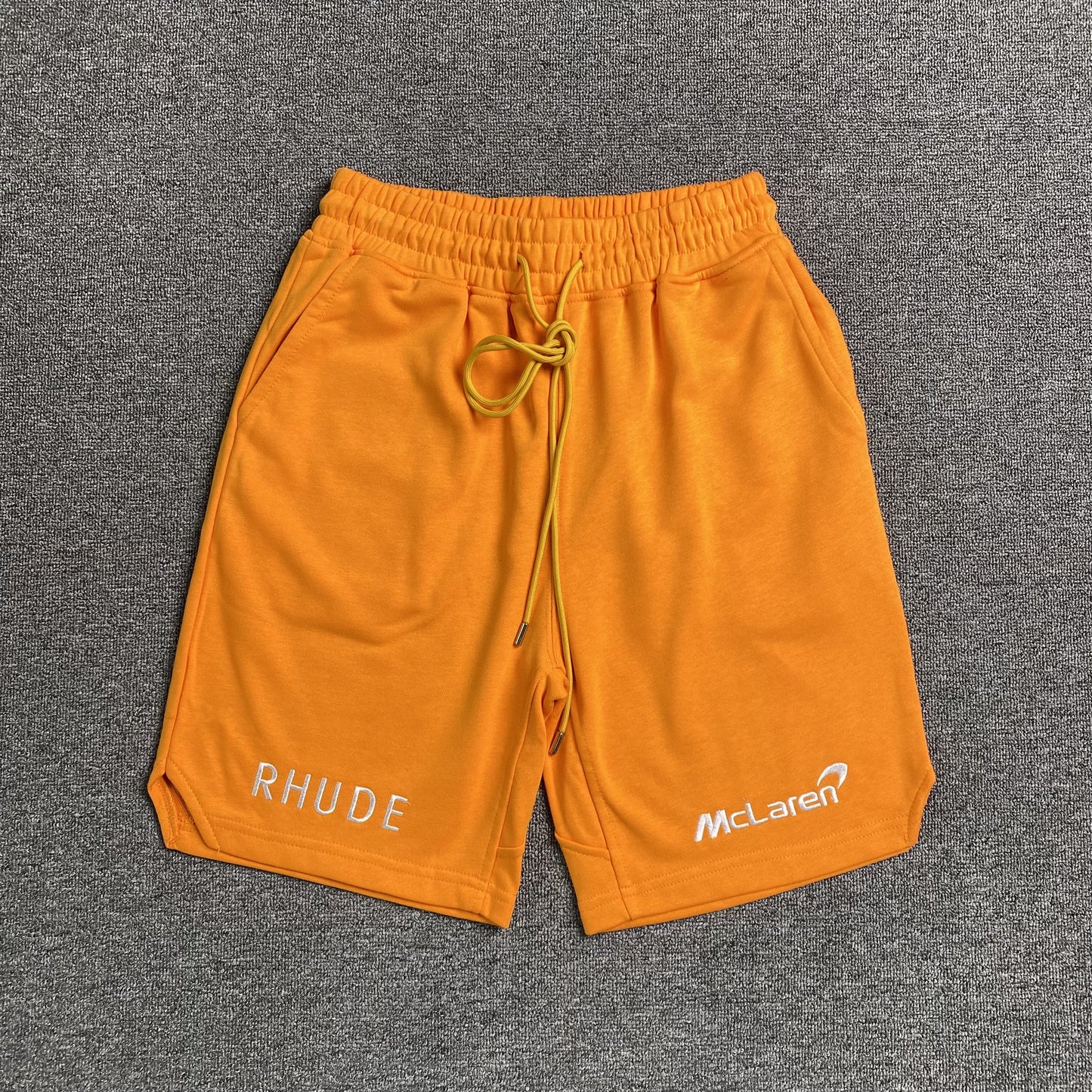 RHUDE X MCLAREN SHORTS ORANGE