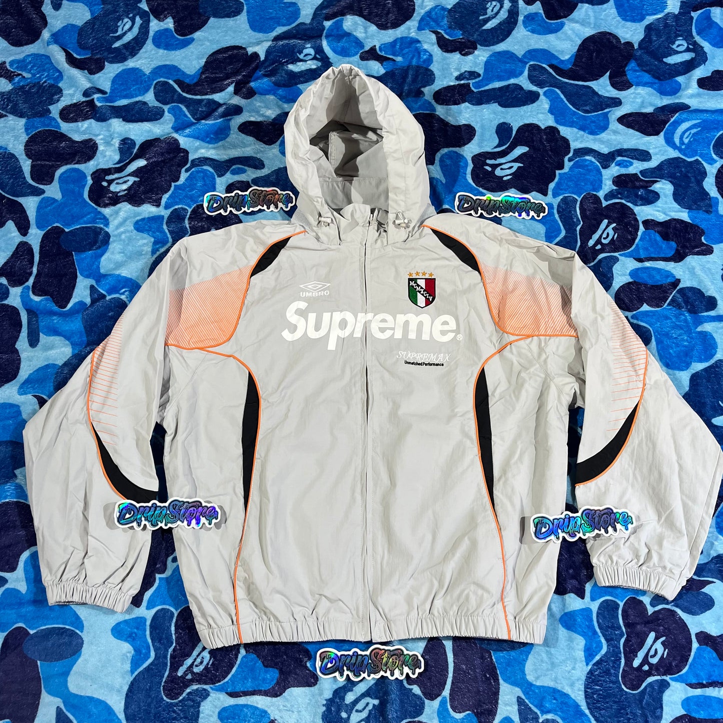 Campera Supreme X Umbro Gris M