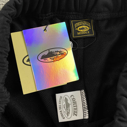 Pantalon Corteiz x Denim Tears Island Wreath Negro