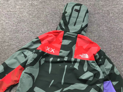 KAWS X THE NORTH FACE RETRO 1986 MOUNTAIN JACKET BALSAM GREEN 86