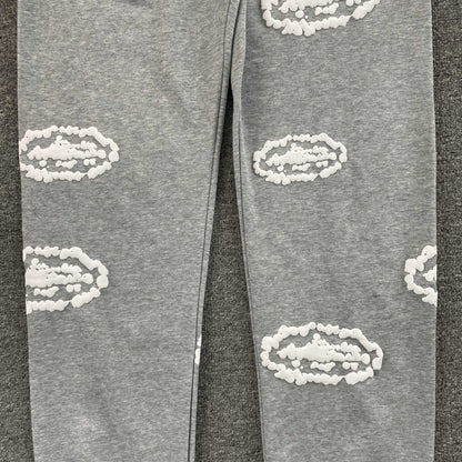 Pantalon Corteiz x Denim Tears Island Wreath Gris