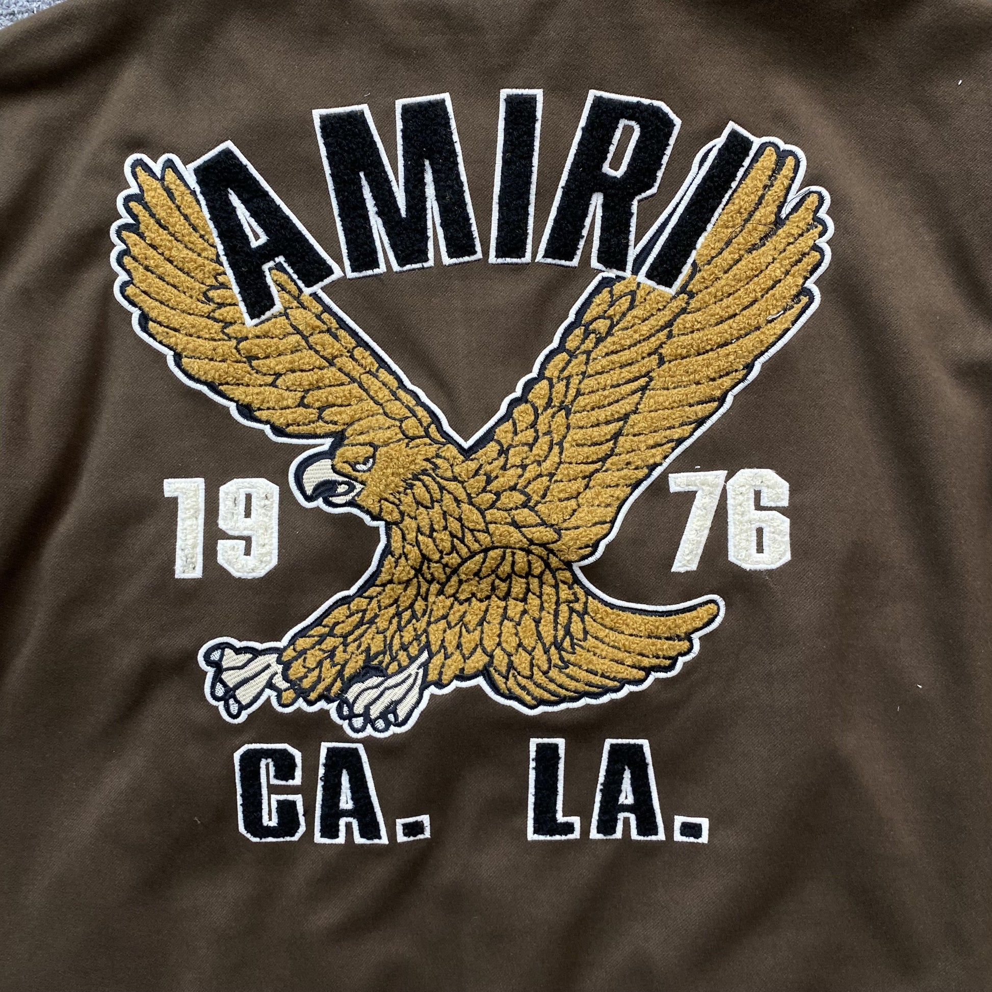 amiri-eagle-bomber-jacket-brown-3-Drip Store Argentina