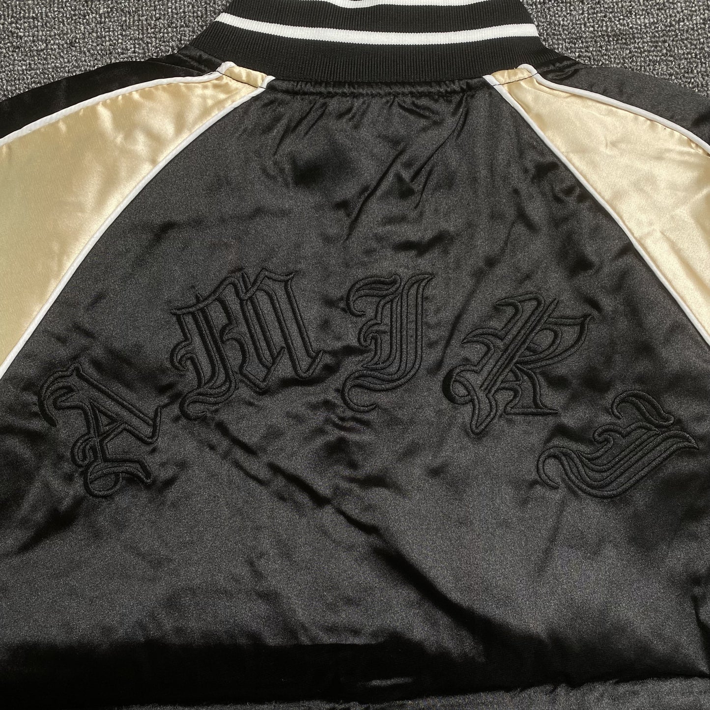 amiri-satin-flames-souvenir-varsity-bomber-jacket-black-7-Drip Store Argentina