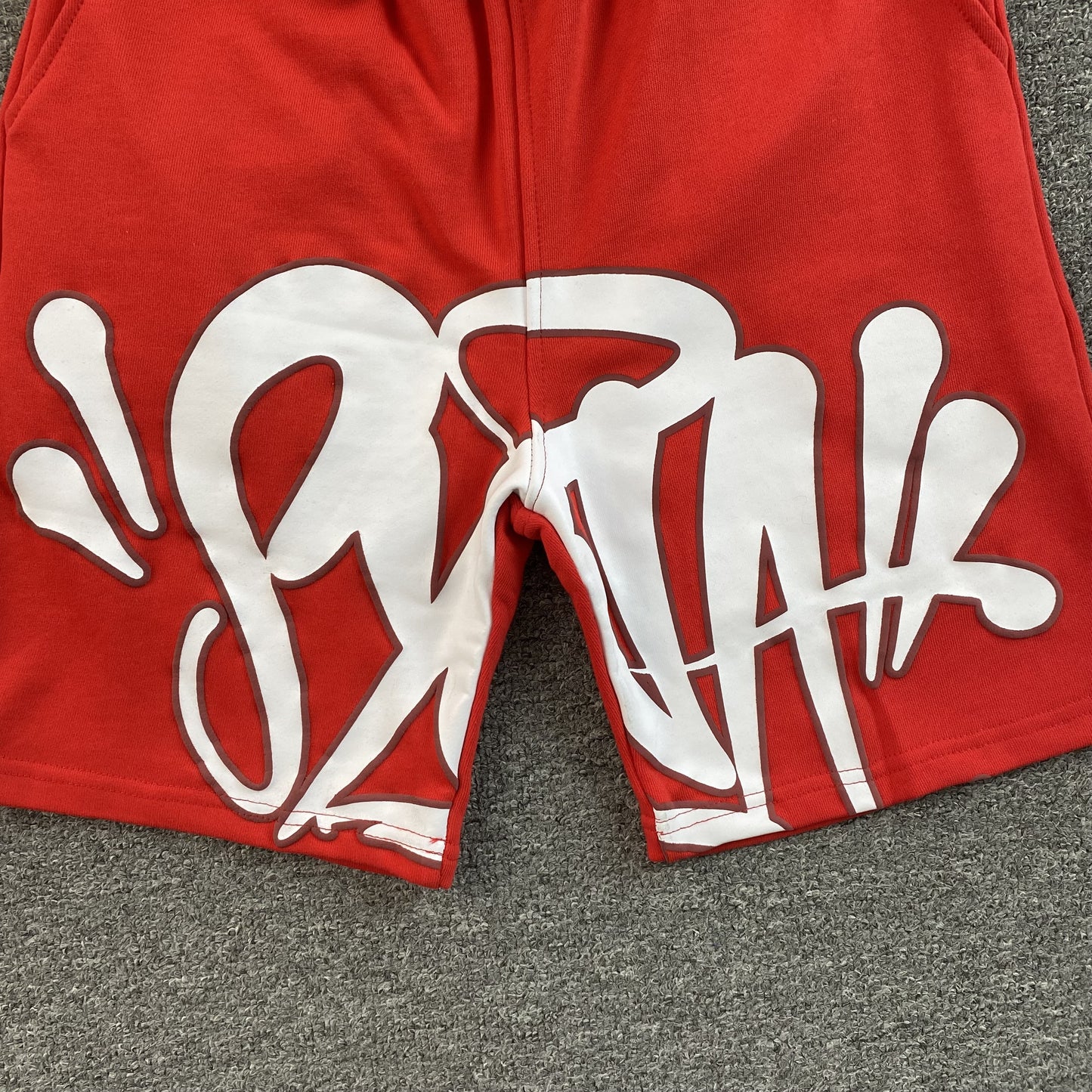 SYNA WORLD SYNA LOGO SHORTS ROJO 