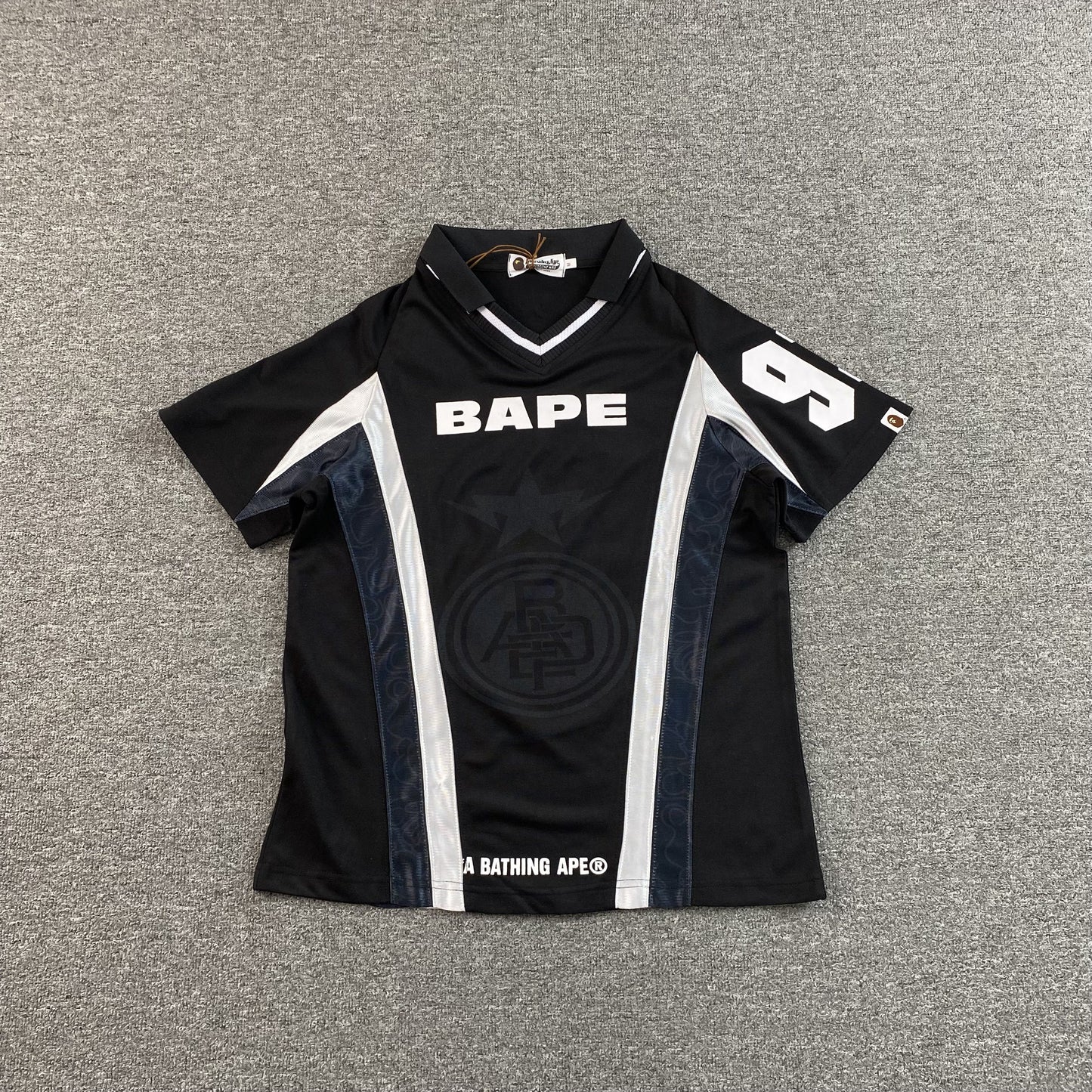 Remera Bape Multi Logo Soccer Jersey Negra
