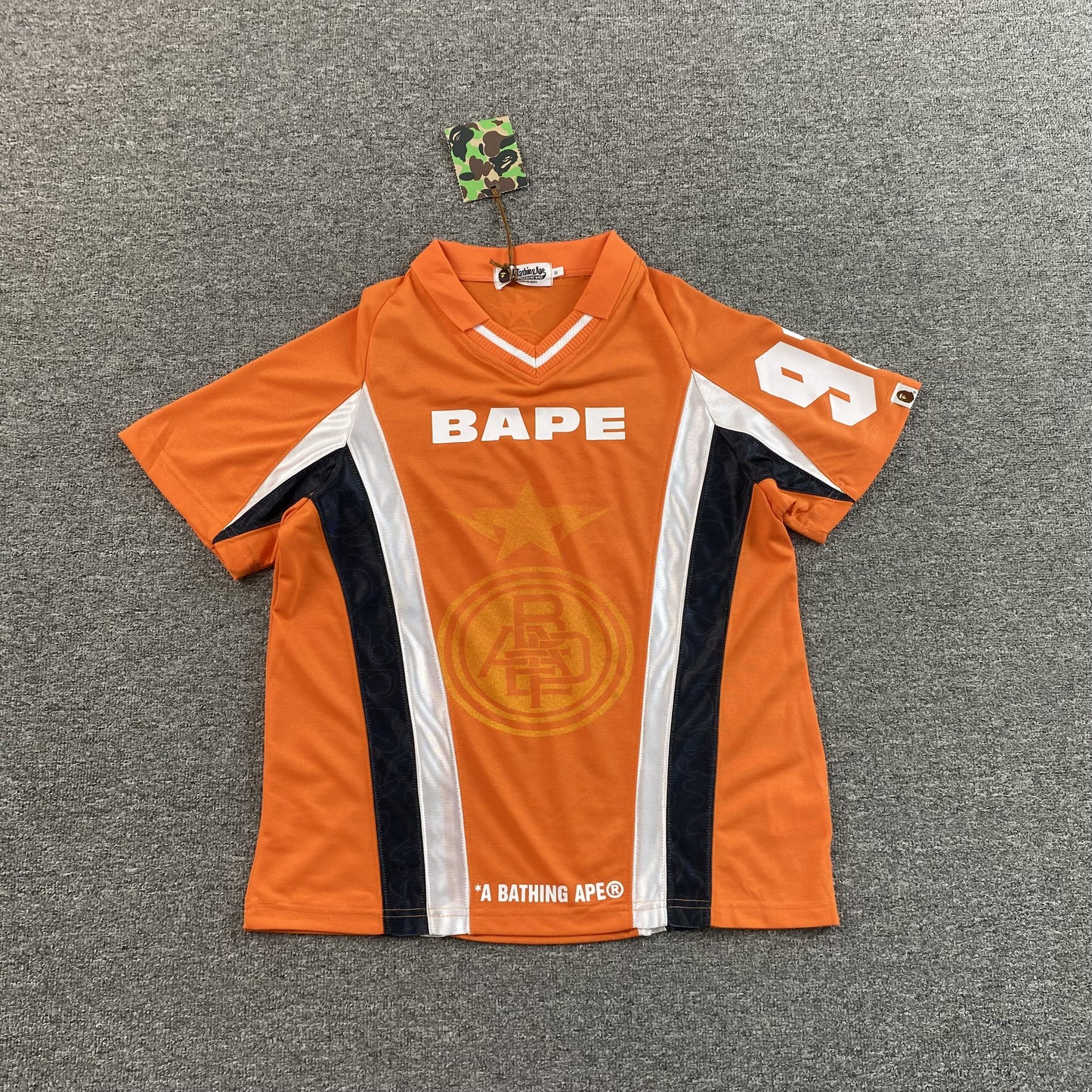 Remera Bape Multi Logo Soccer Jersey Naranja
