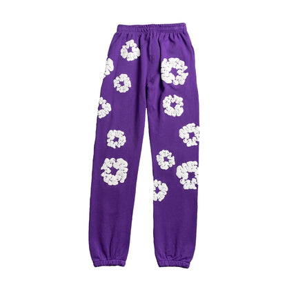 DENIM TEARS THE COTTON WREATH SWEATPANTS PURPLE