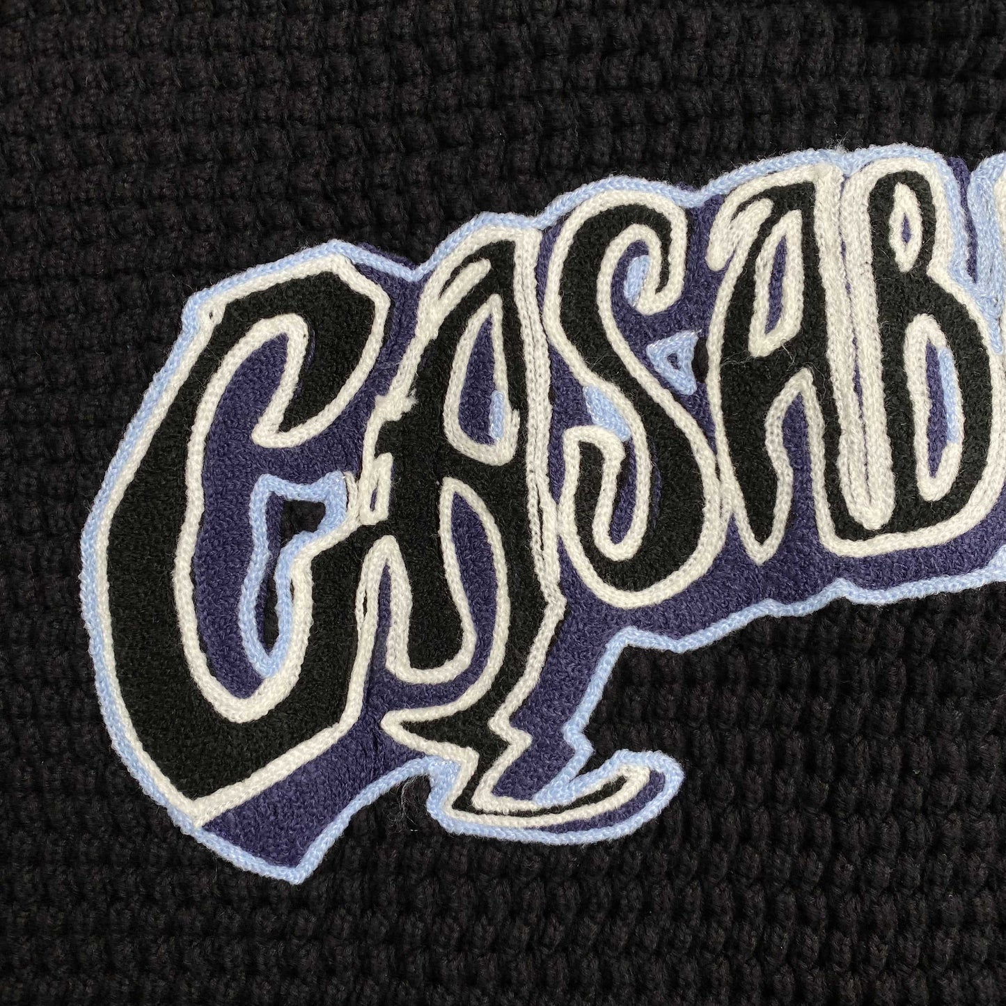 Conjunto Casablanca Crochet Negro Logo