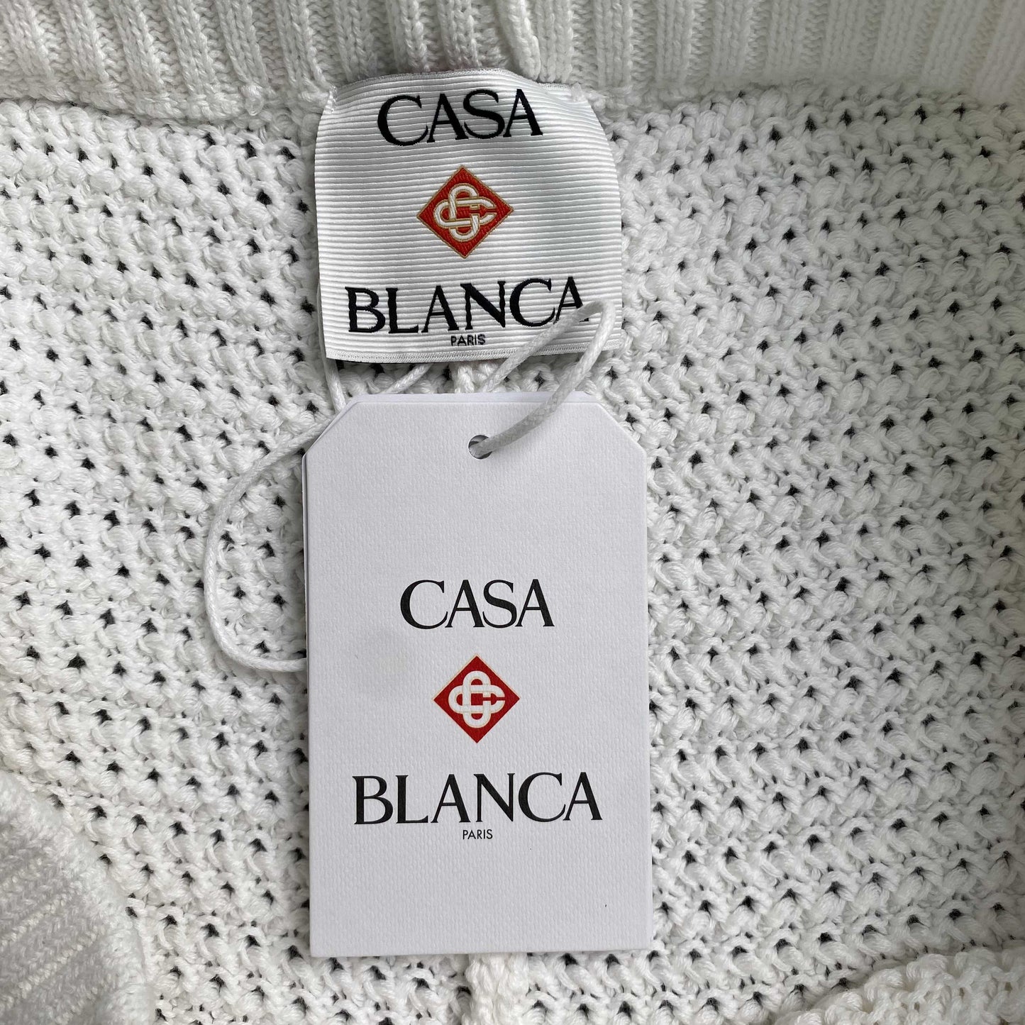 Conjunto Casablanca Crochet Blanco Logo