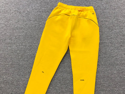 NIKE X DRAKE NOCTA FLEECE PANTS YELLOW