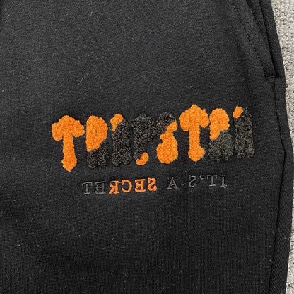 TRAPSTAR CHENILLE DECODED TRACKSUIT BLACK ORANGE