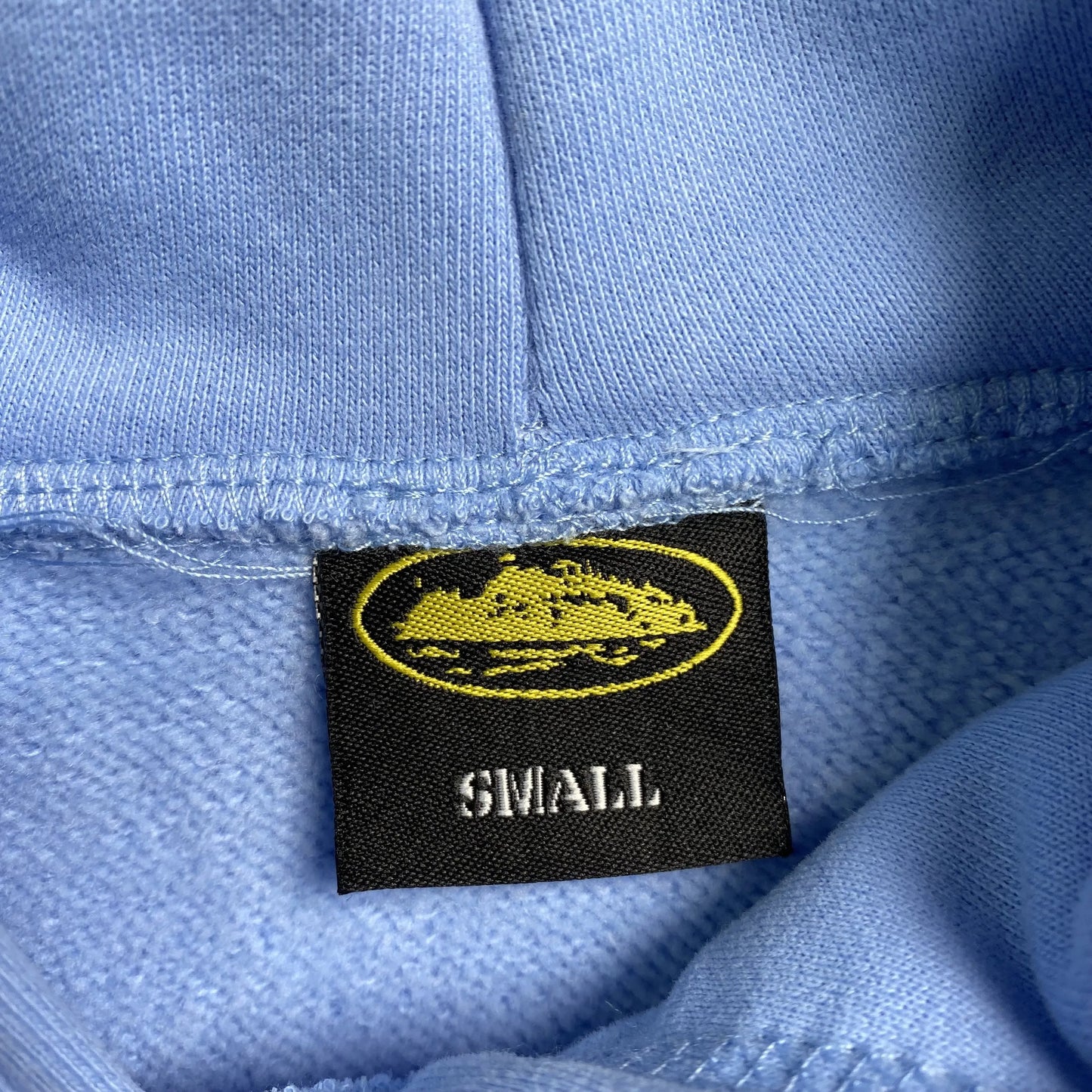 corteiz-alcatraz-hoodie-baby-blue-4-Drip Store Argentina