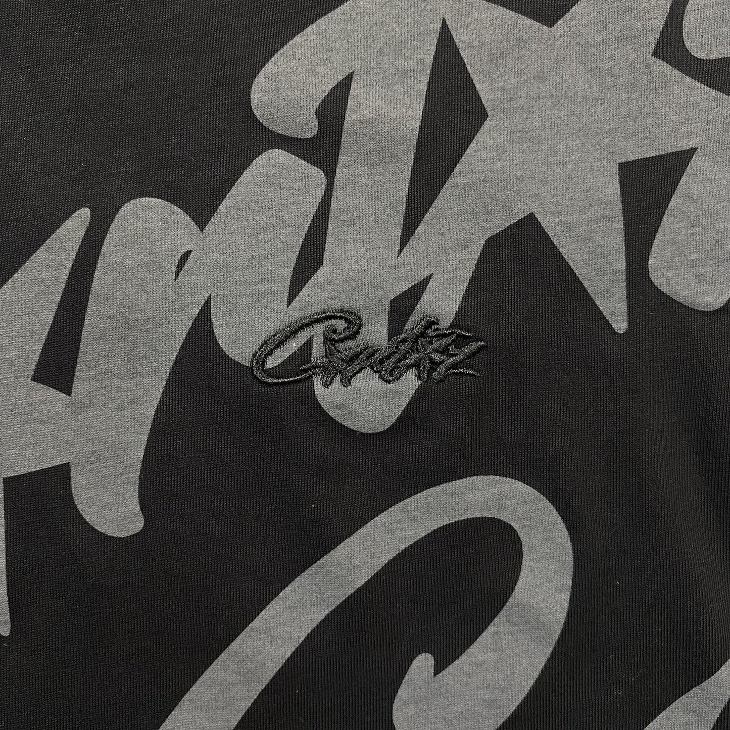 Remera Corteiz Allstarz Allover Negra