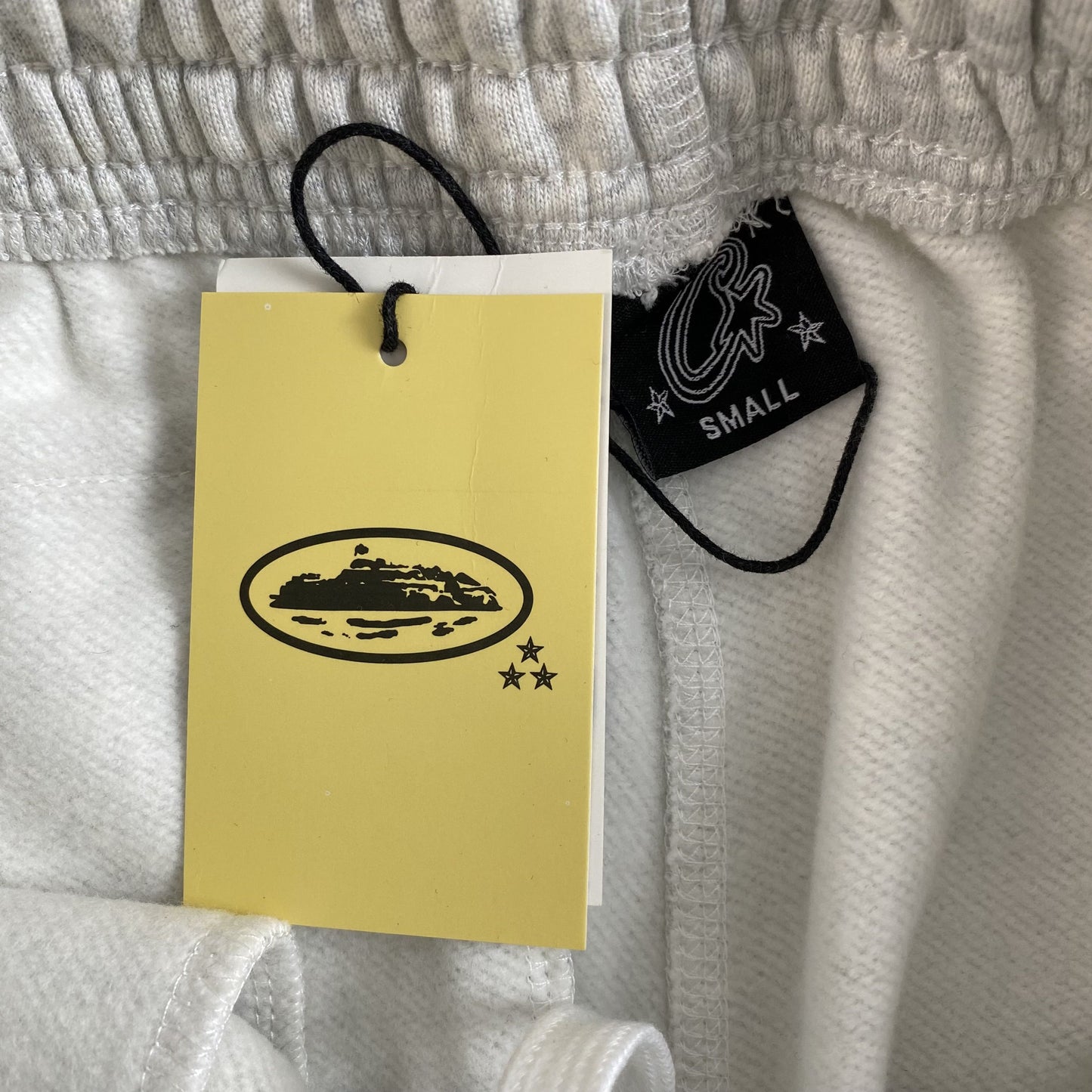 Pantalon Corteiz Colly Arch Open Hem Gris