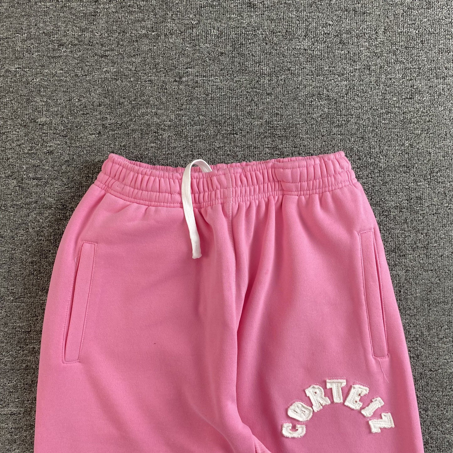 Pantalon Corteiz Colly Arch Open Hem Rosa