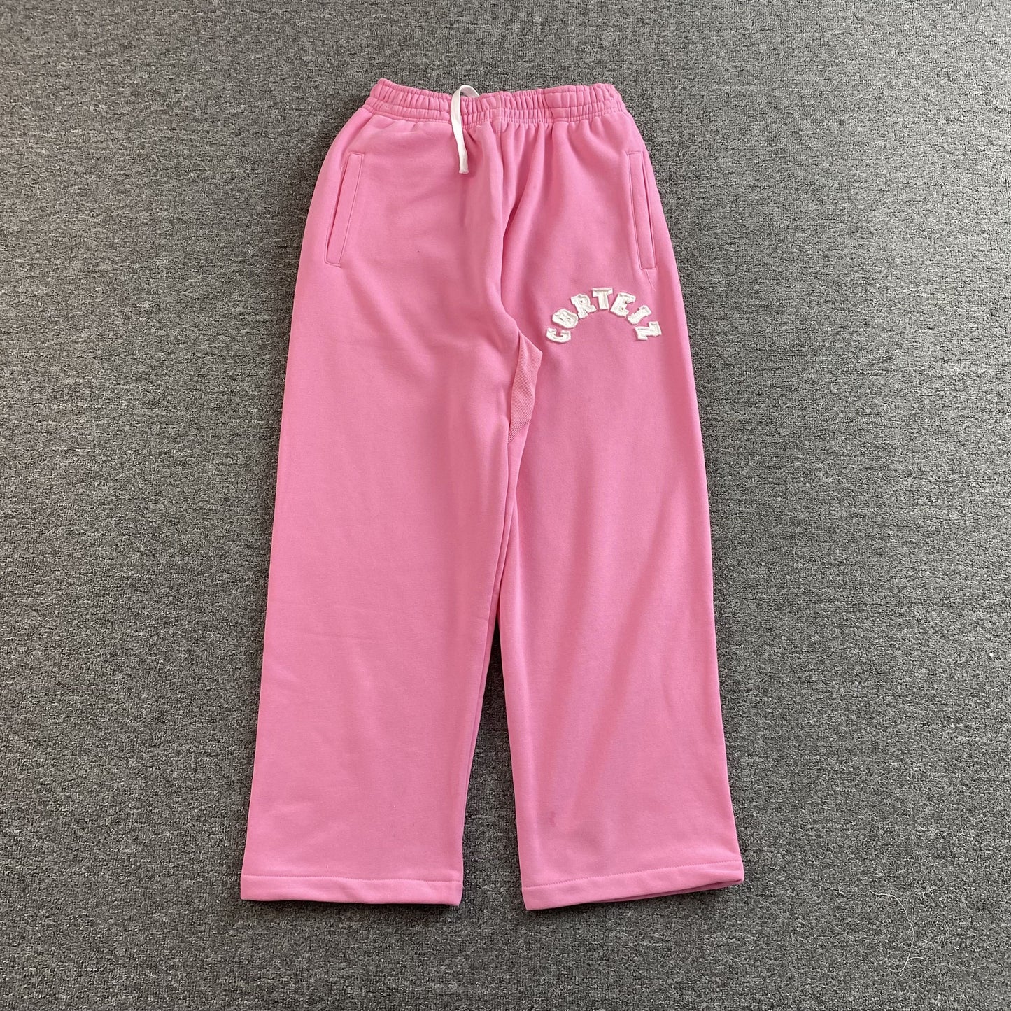 Pantalon Corteiz Colly Arch Open Hem Rosa