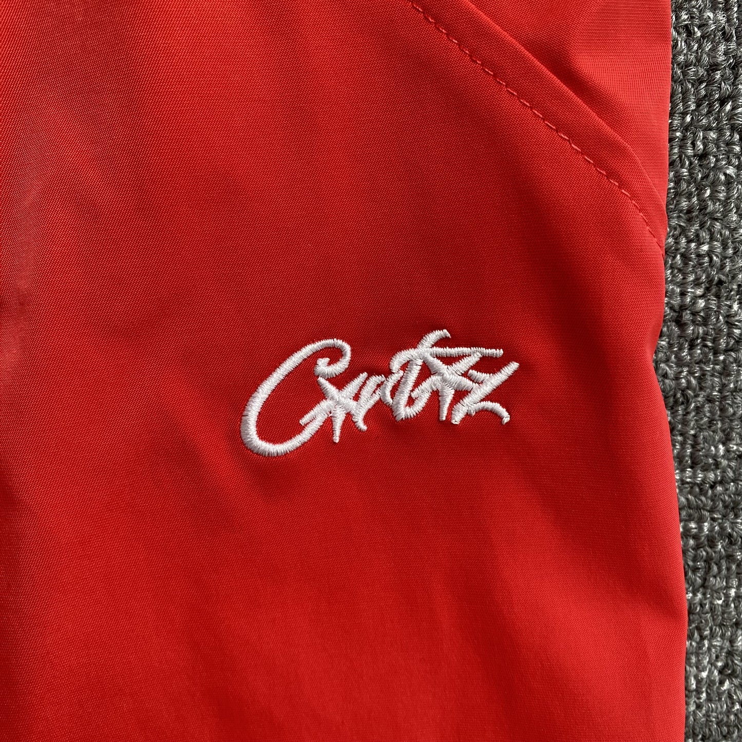 corteiz-elitework-shell-pant-red-3-Drip Store Argentina