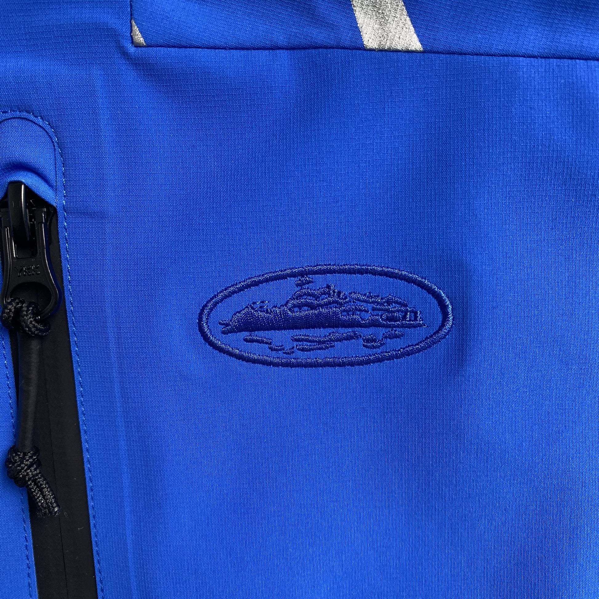 corteiz-elitework-waterproof-shell-jacket-blue-4-Drip Store Argentina