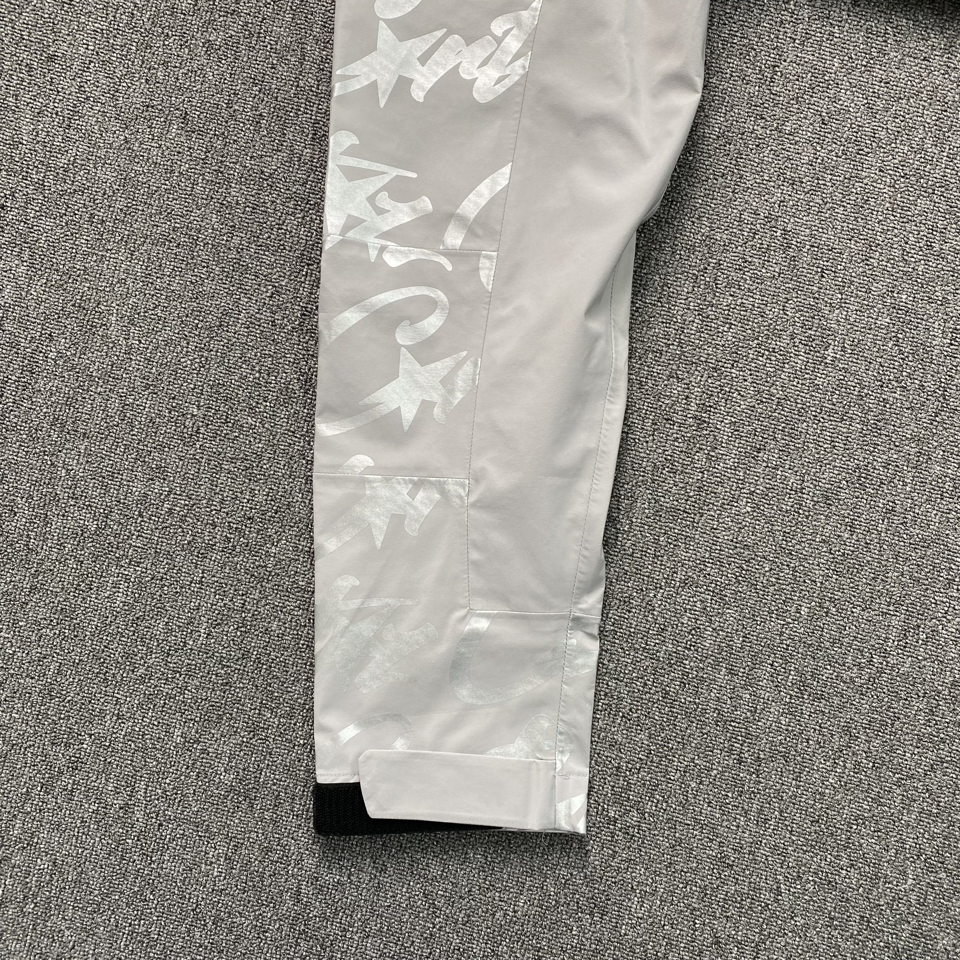 corteiz-elitework-waterproof-shell-jacket-grey-9-Drip Store Argentina