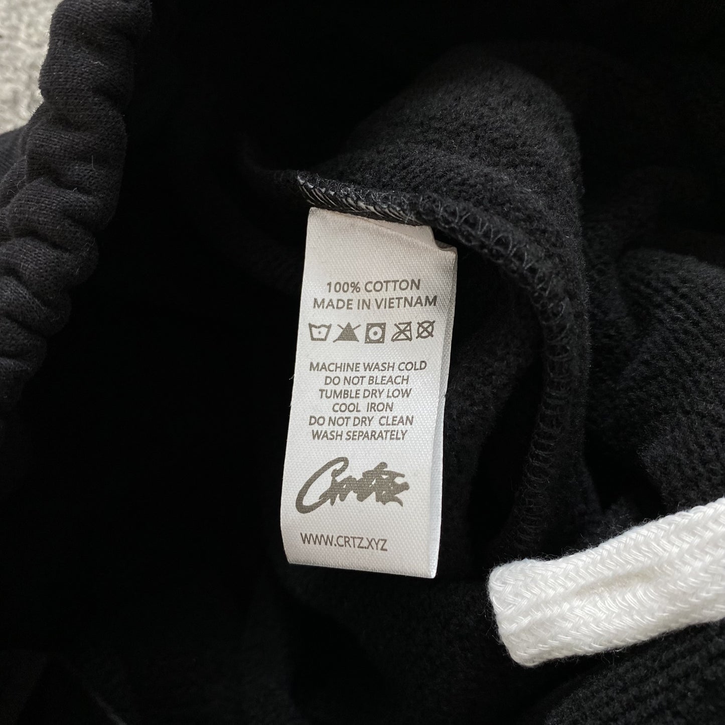 Pantalon Corteiz HMP Open Hem Negro