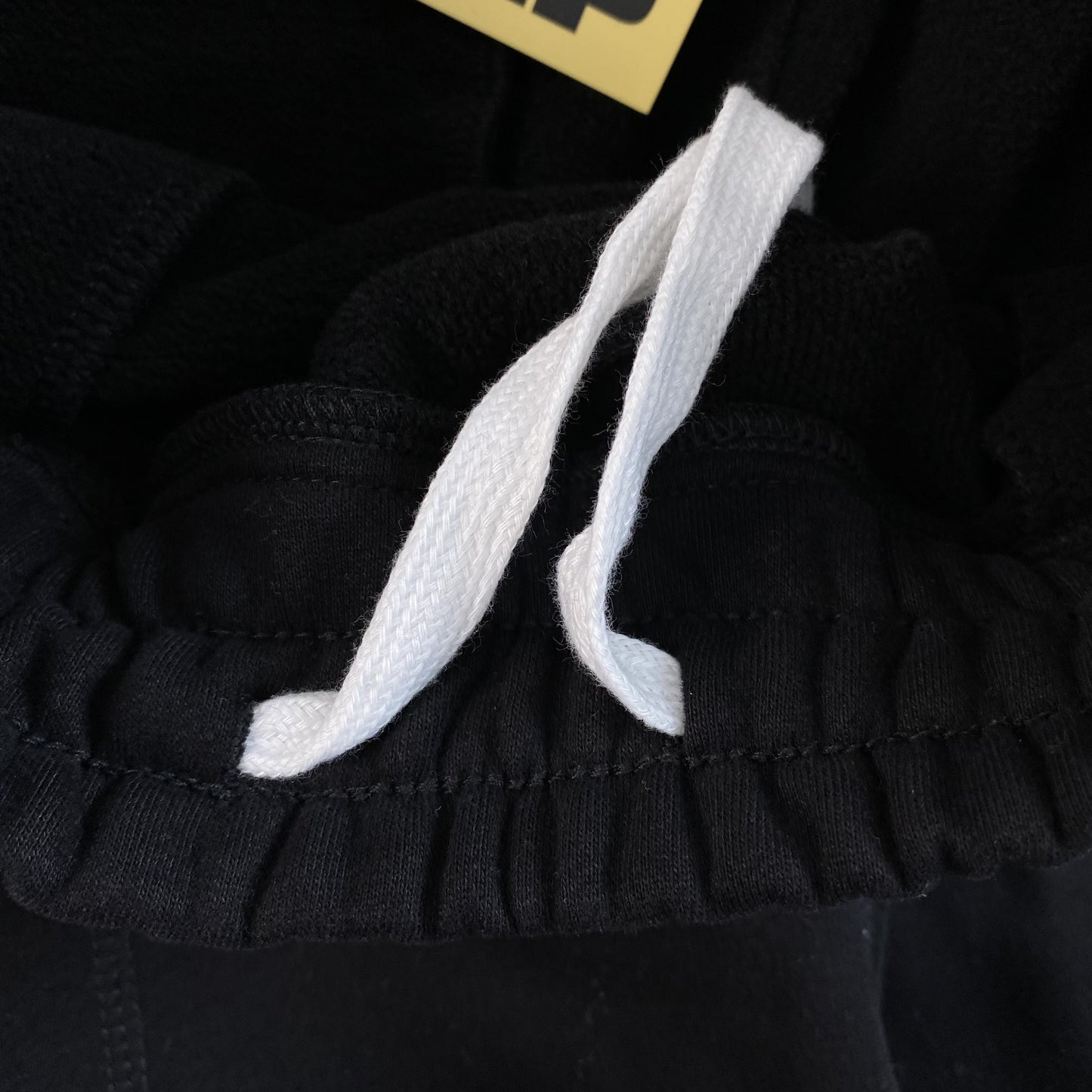 Pantalon Corteiz HMP Open Hem Negro