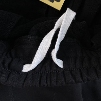 Pantalon Corteiz HMP Open Hem Negro