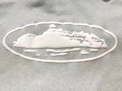 Campera Corteiz Island Puff Print Gris