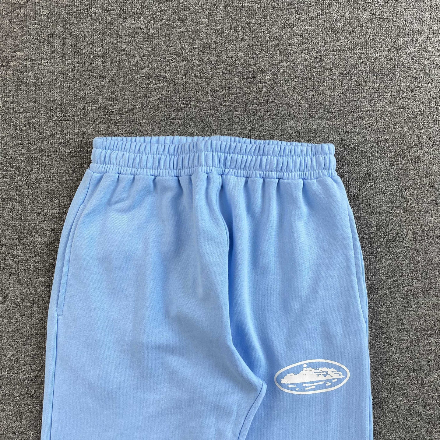 Pantalon Corteiz Island Puff Print Open Hem Celeste