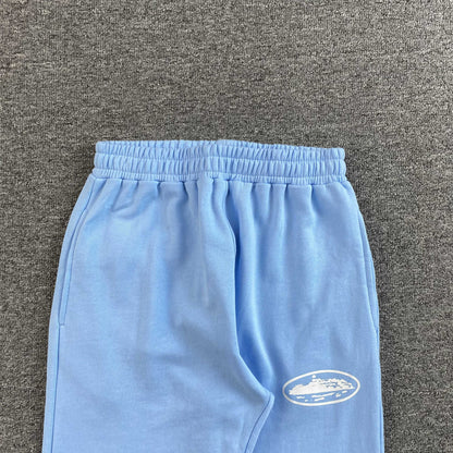 Pantalon Corteiz Island Puff Print Open Hem Celeste