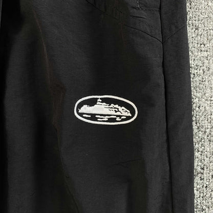 Pantalon Corteiz Sriped Litework Negro