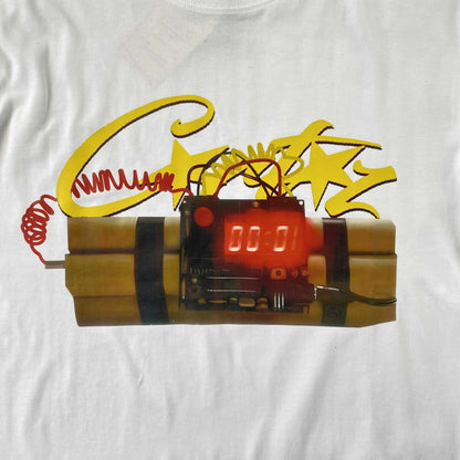 Remera Corteiz Timebomb Blanca