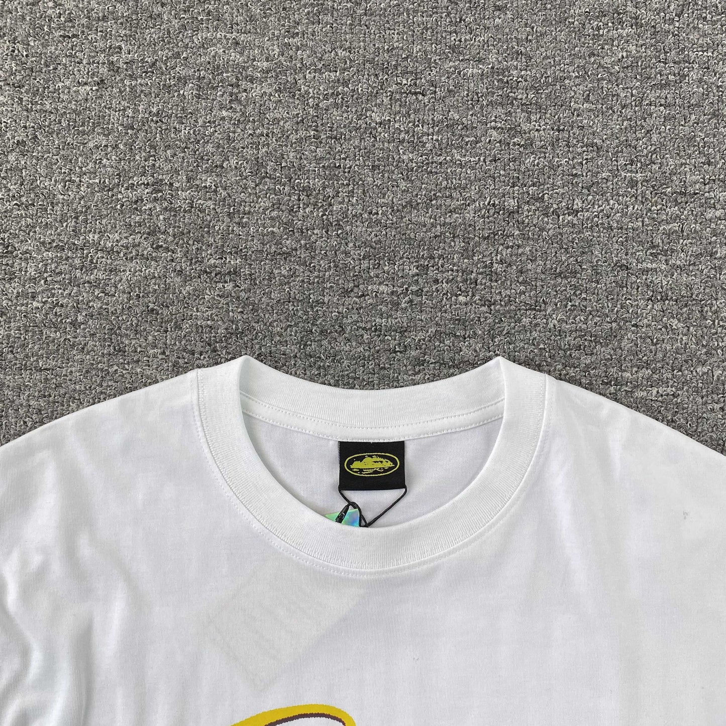 Remera Corteiz Timebomb Blanca