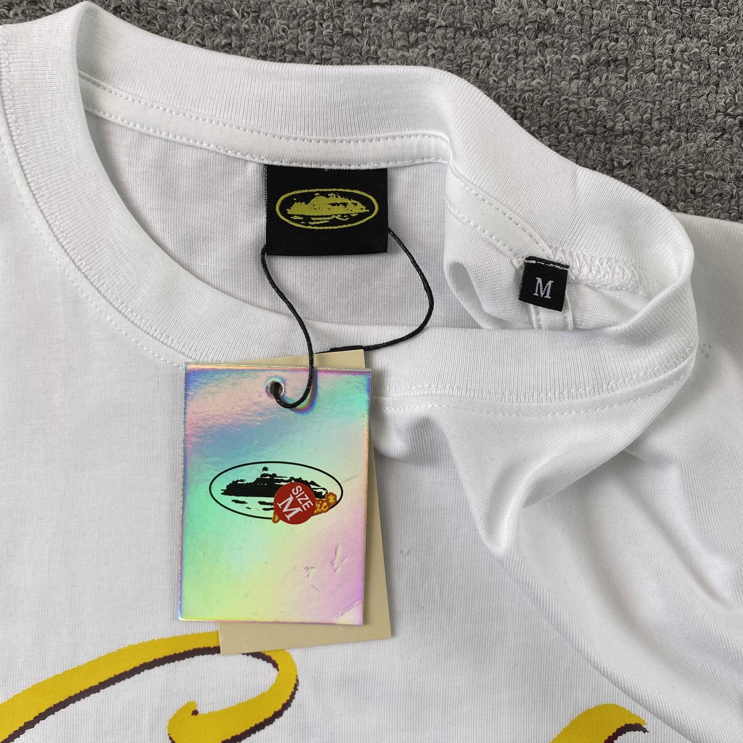 Remera Corteiz Timebomb Blanca