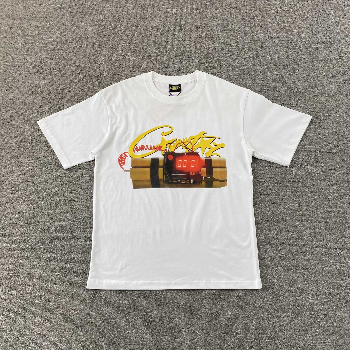 Remera Corteiz Timebomb Blanca